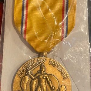 WWII American Defense Medal with Yellow Ribbon, including service bar.